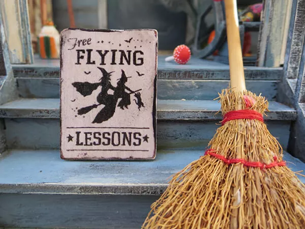 sign and broomstick