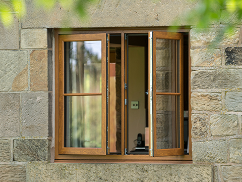 A window with an oak coloured finish